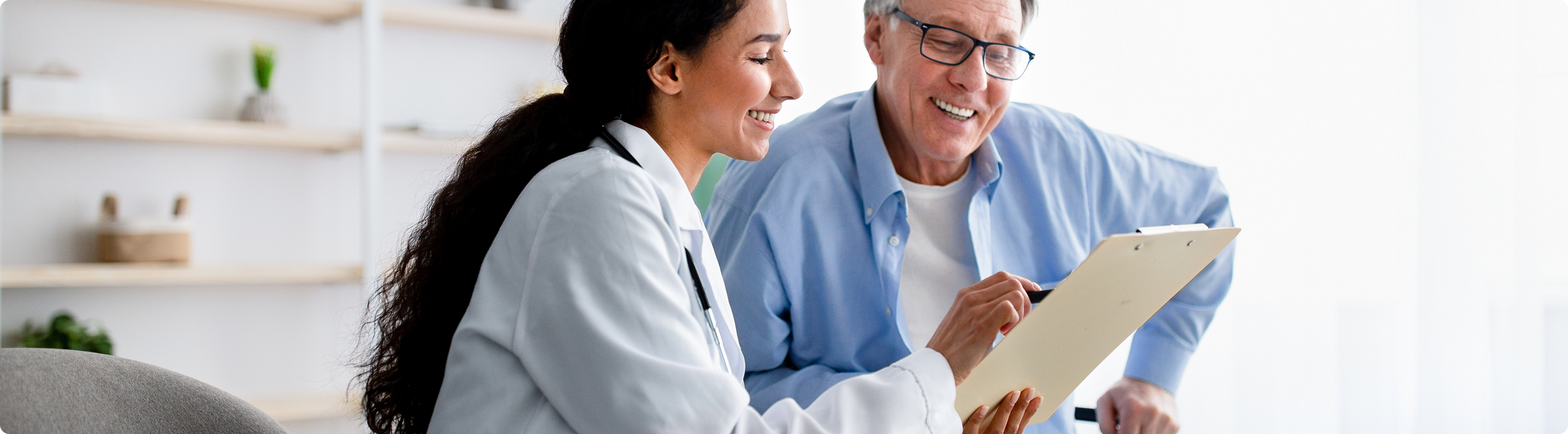 Doctor reviewing charts with patient